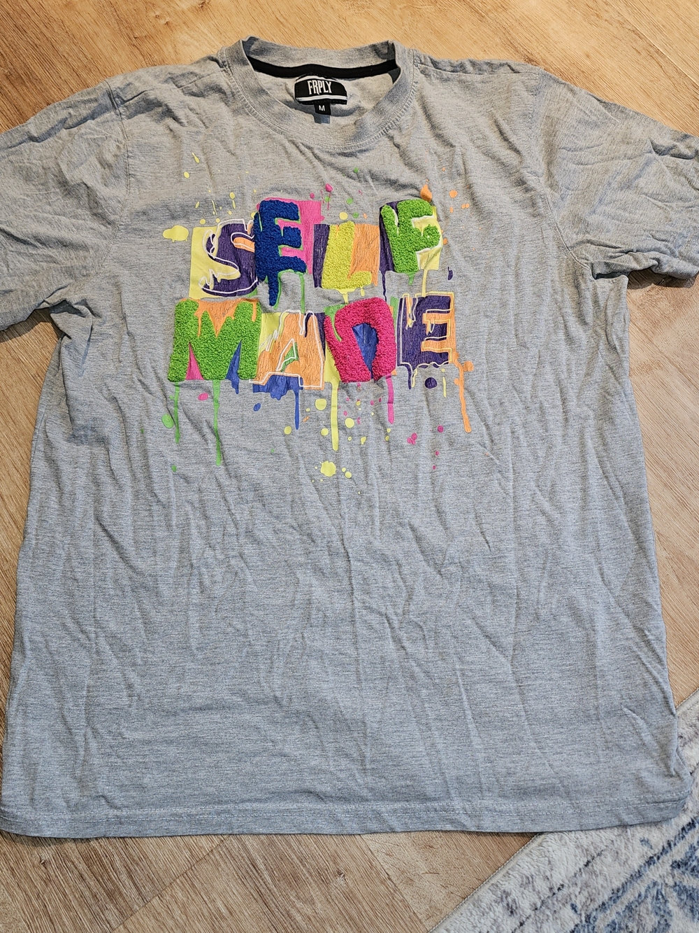 grey FairPlay (FRPLY) "Self Made" graphic t-shirt in a men's size Medium